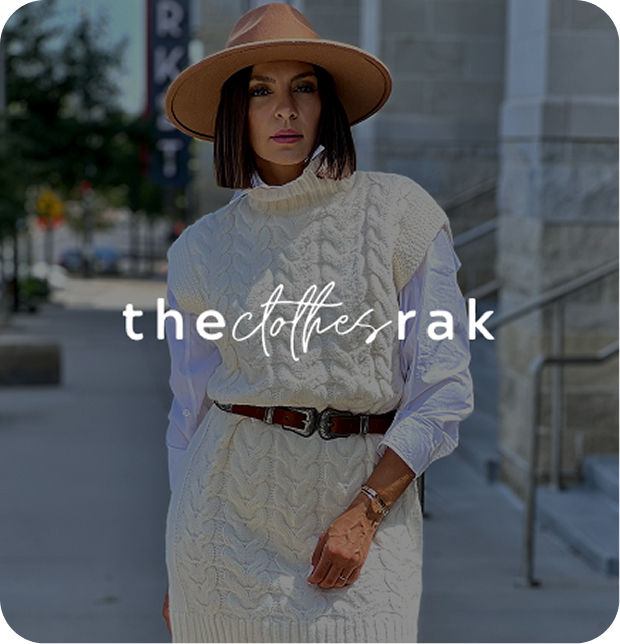 Woman posing with elegant white clothes with a beige hat